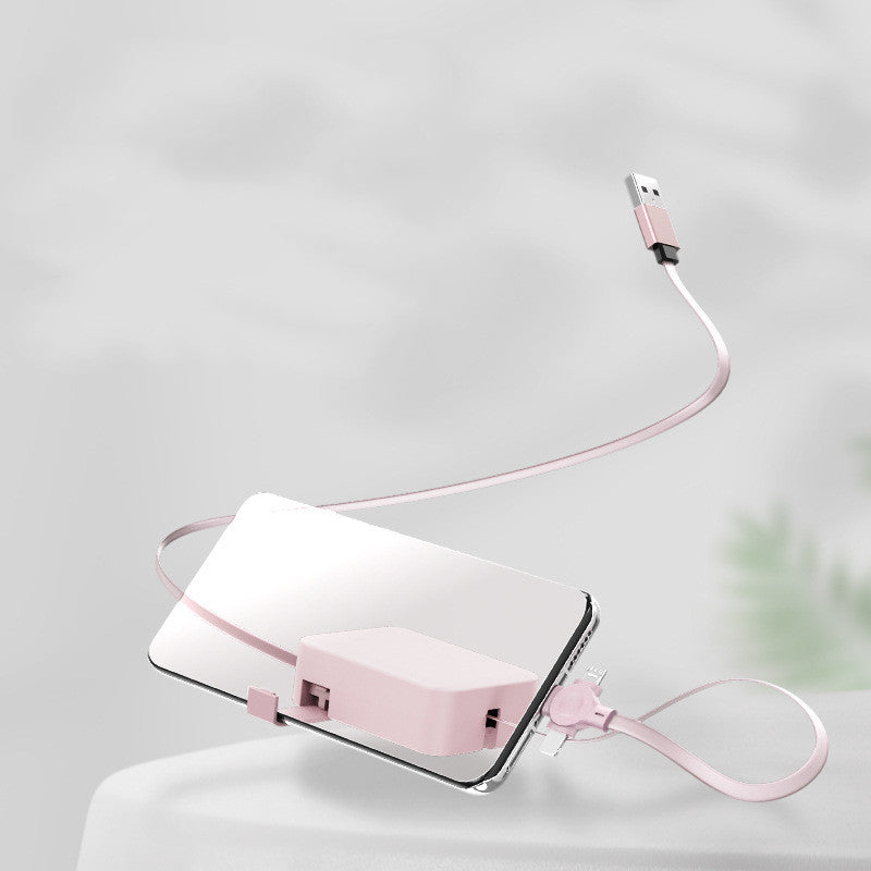 Pink phone case with a charging cable on a light gray background
