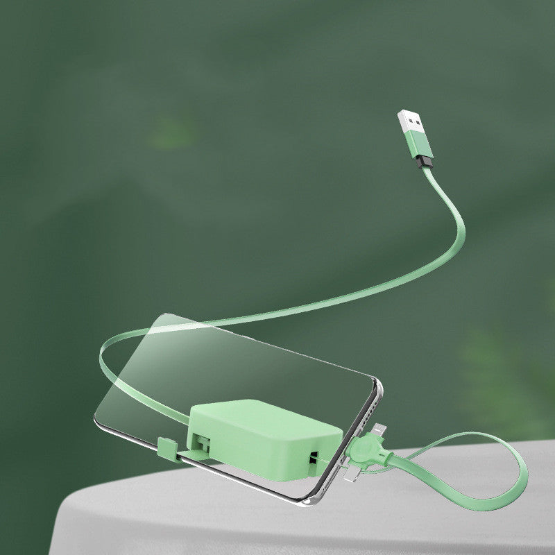 Green USB cable and phone case on a green background